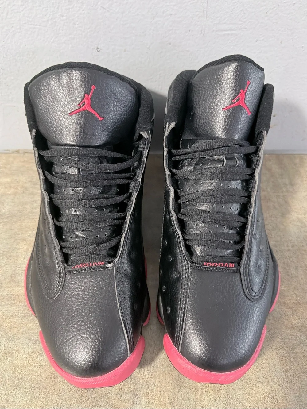 Jordan men’s Black Sneakers with red Outsole Accents